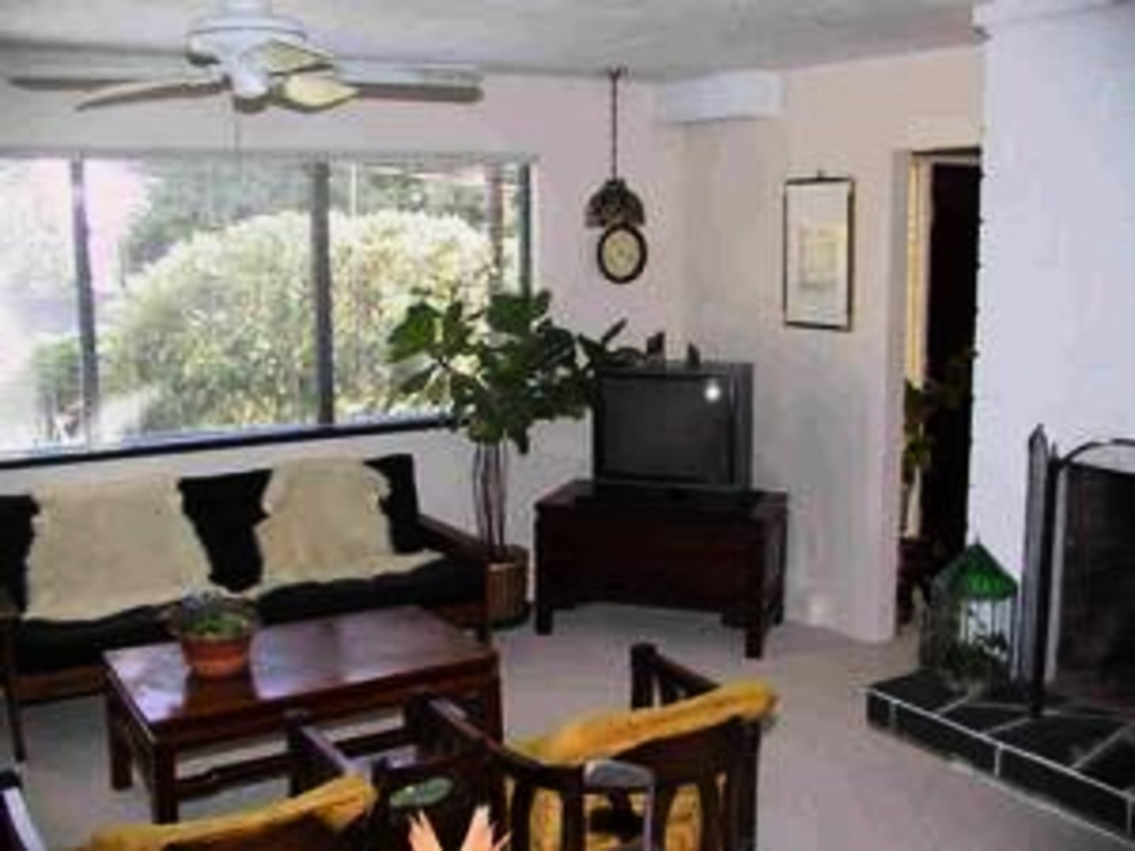 Family Room Lower level with wood-burning fireplace and ocean view