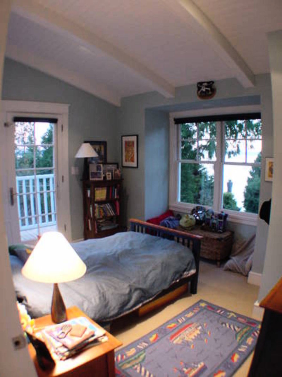 Upstairs Bedroom #2 Vaulted ceiling, french doors to sundeck, ocean view.