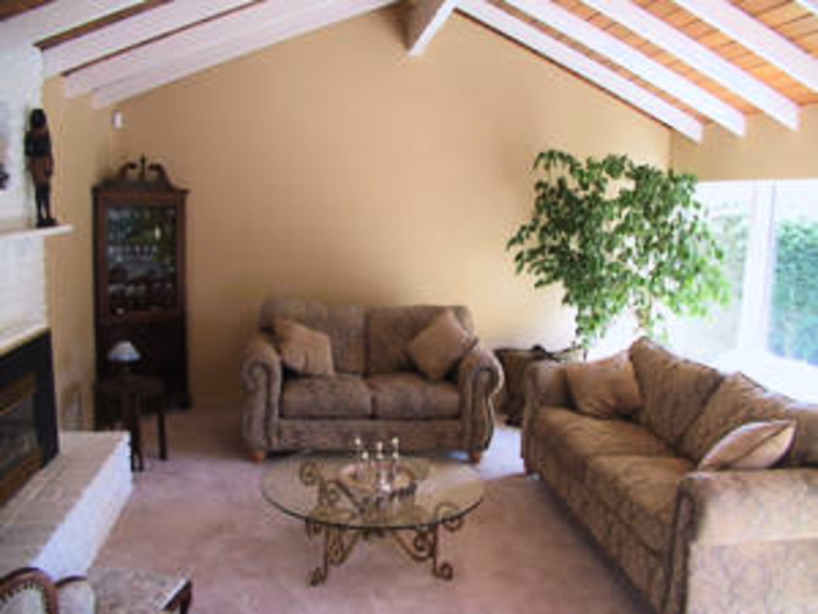 Living Room with gas fireplace and vaulted ceilings