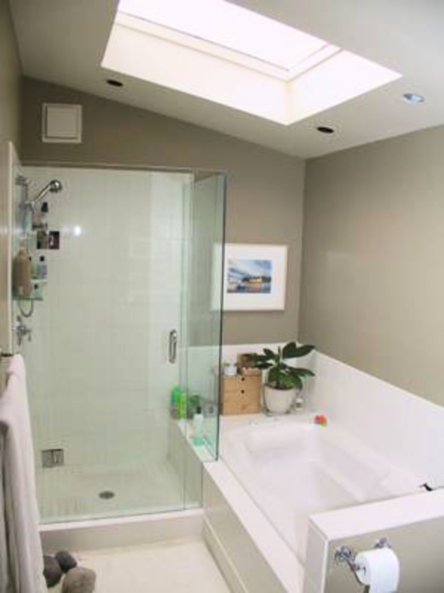 Main Bathroom Up Tiled floors, oversized bathtub, skylight, bay window and tiled floors