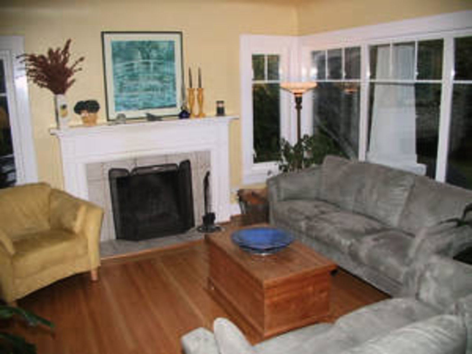 Living Room with hardwood floor and woodburning fireplace